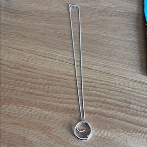 Ed Levin Designs.  Silver Necklace with Circular Pendant.